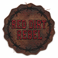 Embroidered iron-on patch saying Red Dirt Rebel in bold rugged western lettering with deep reds, blacks, and browns