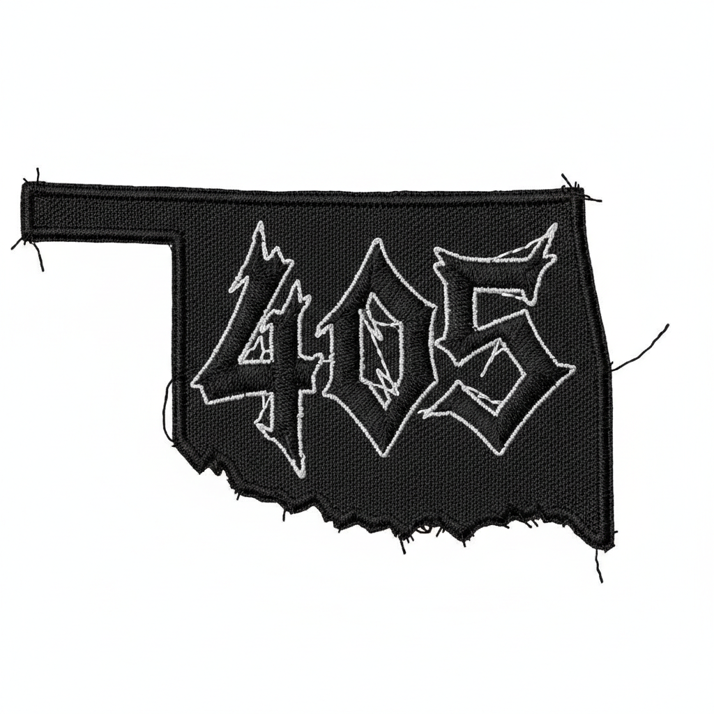 Black and grey embroidered iron-on patch in the shape of Oklahoma with 405 in bold punk style numbers